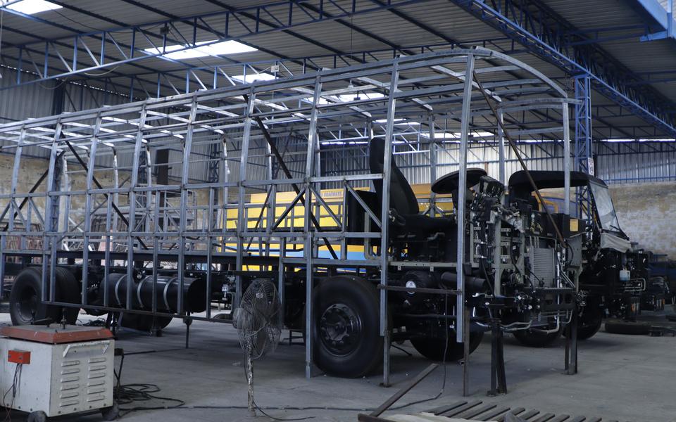 GP-tube bus body skeleton built up on a chassis on the Gobind Coach shop floor
